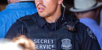 Secret Service agent in uniform with equipment visible