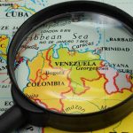 Opposition Leader’s Alleged Kidnapping Sparks New Tension in Venezuela’s Crisis Magnifying glass over a map of Venezuela.