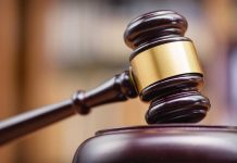 Judges gavel on a wooden block courtroom setting