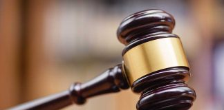 Judges gavel on a wooden block courtroom setting