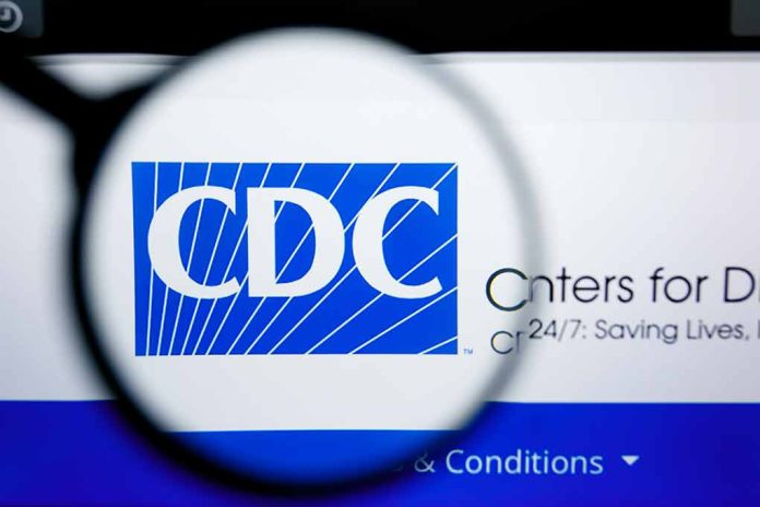 1450445633 featured image CDC logo magnified on a screen.