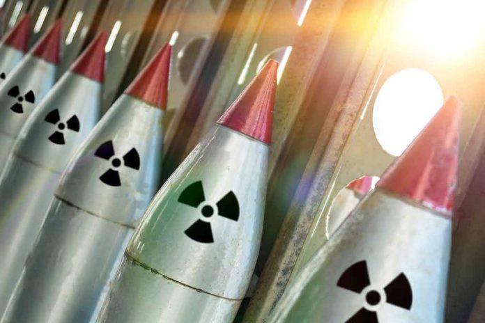 1090003628 featured image Line of nuclear missiles with radiation hazard signs.