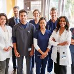 Group of medical professionals in a hospital setting.