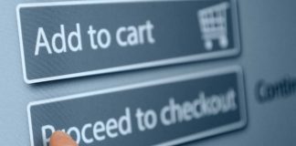 Finger tapping proceed to checkout button online