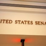 Mallory McMorrow Challenges Democratic Norms in New Senate Bid United States Senate sign on wall