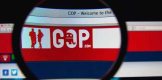 Magnifying glass on GOP website logo on screen