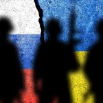 Silhouettes on split Russian and Ukrainian flags background