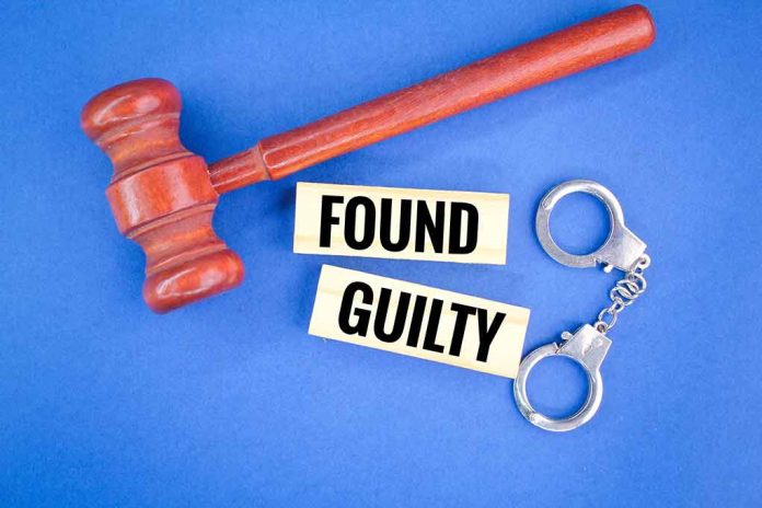 2256788489 featured image Gavel handcuffs and text found guilty on blue