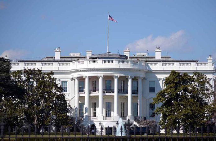 444665077 featured image White House with American flag flying, daytime.