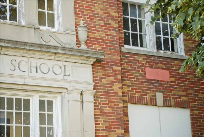 708662041 featured image Brick school building with windows and foliage.