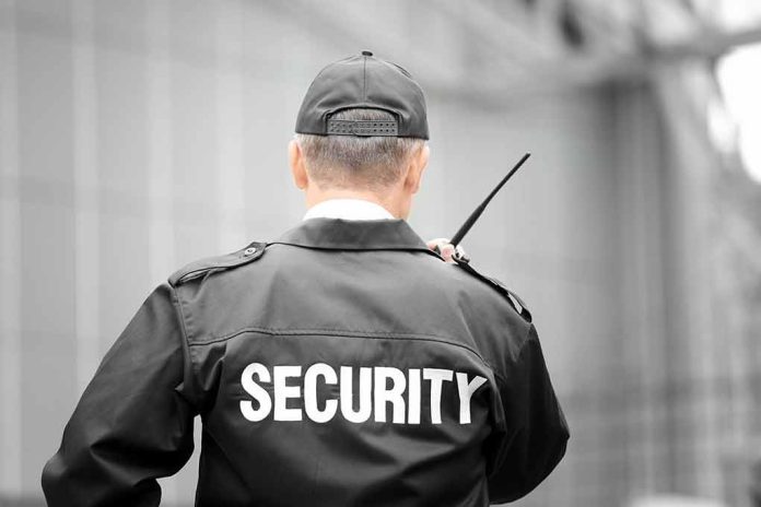 782064622 featured image Security guard holding a walkie-talkie.