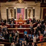 People gathering in United States legislative chamber meeting room