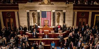 People gathering in United States legislative chamber meeting room