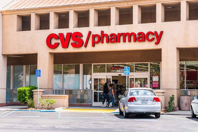 1471184933 featured image CVS Pharmacy store entrance with parked cars outside