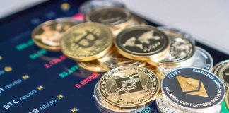 Cryptocurrency coins on a trading screen background