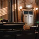 Empty courtroom with judge bench and wooden decor