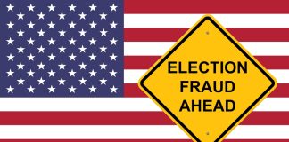 Yellow sign reading Election Fraud Ahead with American flag