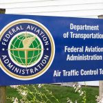 Federal Aviation Administration sign outside white building