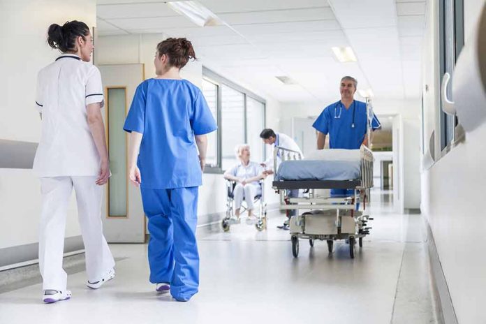 786971899 featured image Doctors and nurses in hospital corridor with stretcher