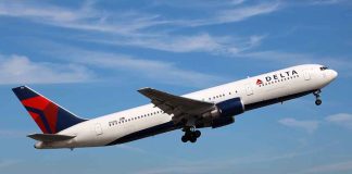 Delta airplane taking off from runway