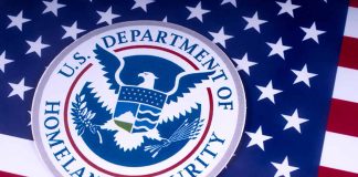 Department of Homeland Security seal on American flag