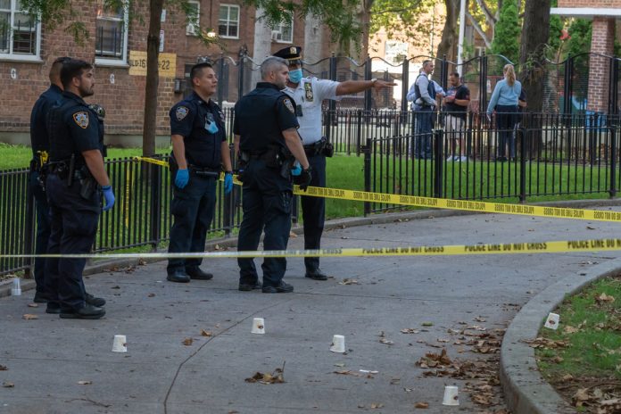 1798487980 featured image Police officers at a crime scene investigation outdoors
