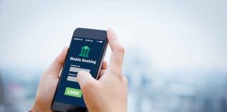 Person using mobile banking app on smartphone