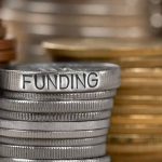 Gates Drops $200 Billion—Musk Calls Out Epstein Ties Stack of coins labeled funding with other coins stacks