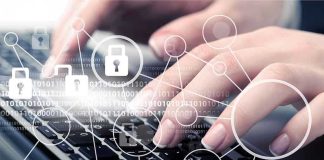 Hands typing with cybersecurity icons overlay