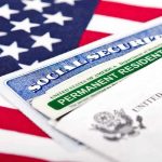 Social Security card and green card on flag.