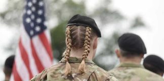 Soldier with braided hair in uniform
