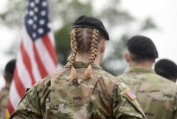 2038666382 Soldier with braided hair in uniform