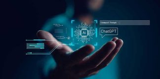 Hand holding digital AI and ChatGPT graphics