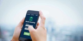 Person using mobile banking app on smartphone