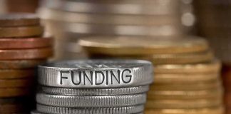 Stack of coins labeled funding with other coins stacks