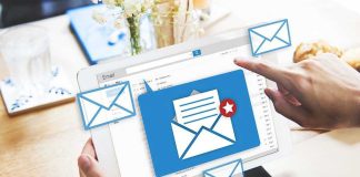 Tablet displaying email inbox with notifications icon