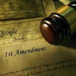 Gavel, Constitution, and document showing 1st Amendment.