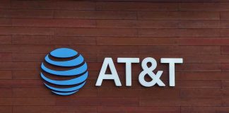 AT&T logo displayed on a wooden wall