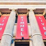 Exterior view of the Jimmy Kimmel Live studio with large red banners