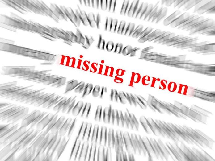 Text graphic highlighting missing person in red among blurred words