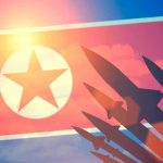 North Korean flag with missile silhouettes.