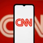 CNN logo on a phone screen.