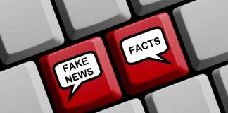 Keyboard keys labeled Fake News and Facts.