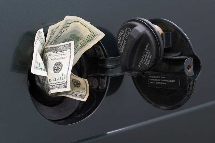 Cash sticking out of a cars gas tank