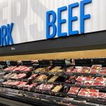 Trump Angers Ranchers: Beef Tariff Slash Meat section with packaged pork and beef products