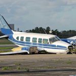 Raúl Castro’s Explosive Murder Indictment Incoming! Damaged blue and white small airplane on an airport runway