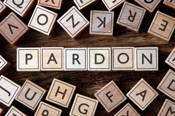 shutterstock_403829578-3- Wooden letter blocks arranged to spell 'PARDON' on a wooden surface