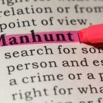 ABHORRENT Convicted Predator VANISHES — MANHUNT Explodes Pink highlighter marking word manhunt in book