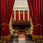 SCOTUS Hands TRUMP The Firing Pin U.S. Supreme Court building under clear blue sky.