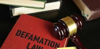 Defamation law book with gavel and illustration